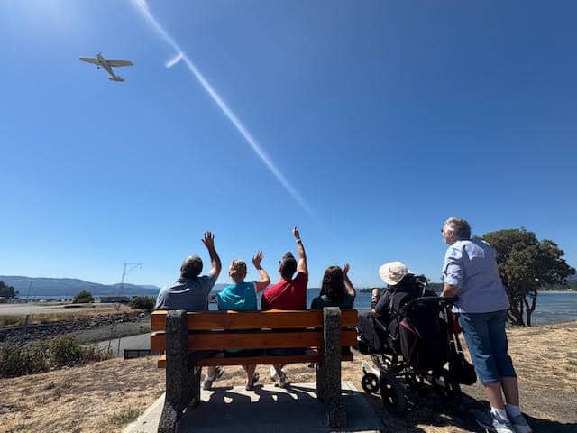 Paul and family watching airplanes